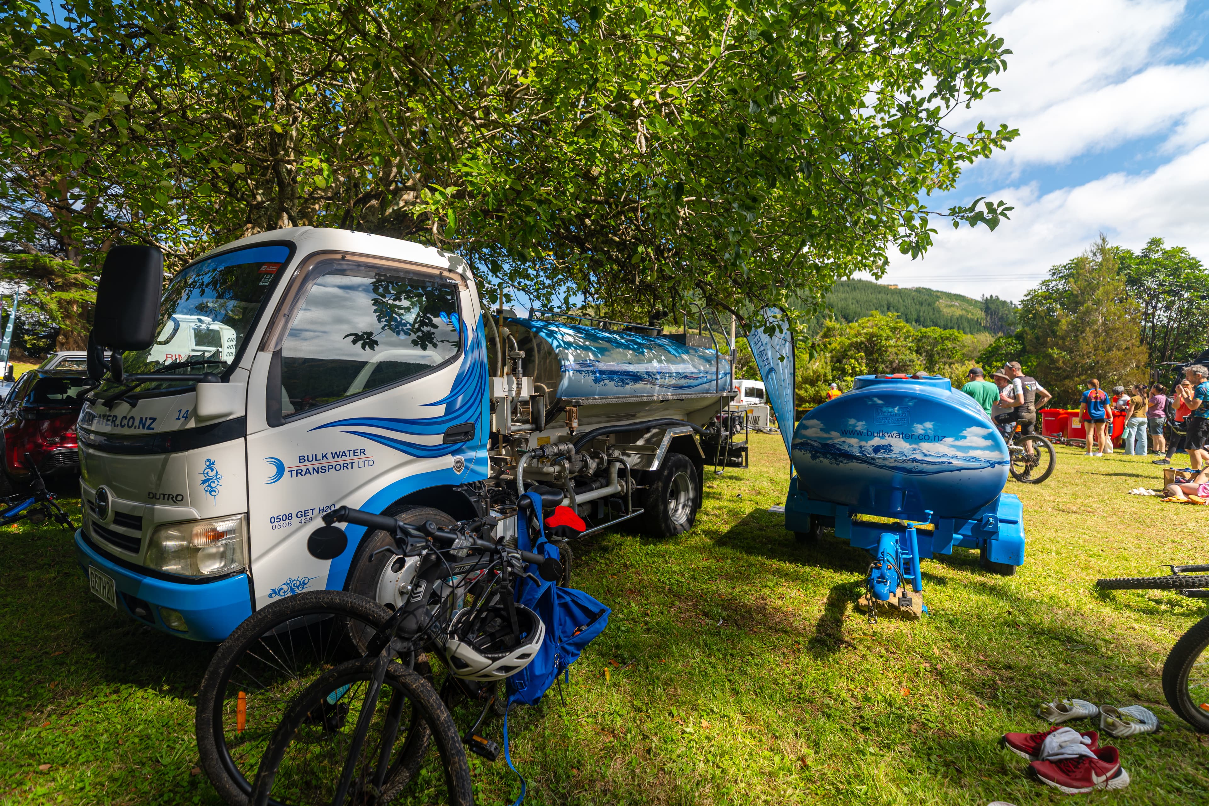 BWT truck and branded trailer at outdoor event