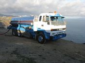 Bulk Water Truck Near the Open Ocean